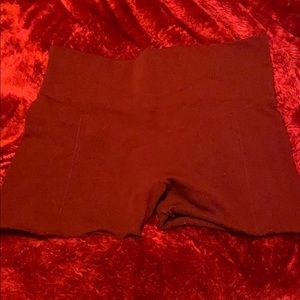 Tight maroon dance shorts